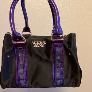 Black and purple Victoria’s Secret makeup bag